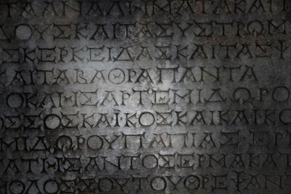 Надписи, высеченные в камне на древние руины Лицензионные Стоковые Изображения