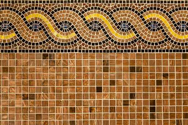 Мозаика в древнем стиле, уложены плиткой крошечные коричневый, желтый, синий — стоковое фото