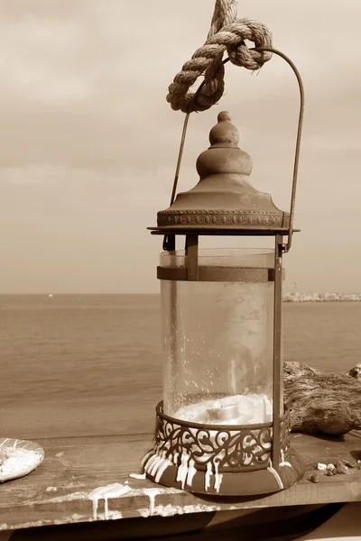 Фонари на берегу моря на сепию Стоковое Фото