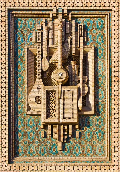 Мозаика музыкальных инструментов из кирпича — стоковое фото