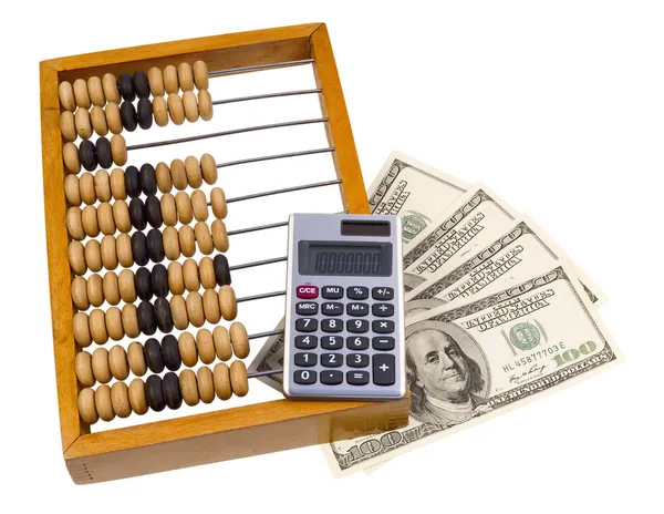 Старые деревянные счеты, калькулятор и you.s долларов — стоковое фото