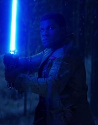 Finn with lightsaber